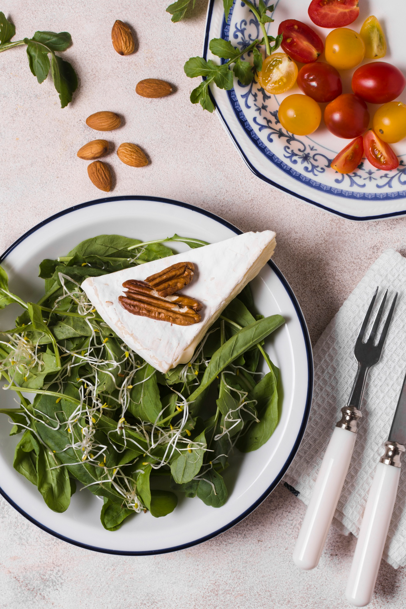 A weekly meal planning notebook surrounded by simple fresh ingredients